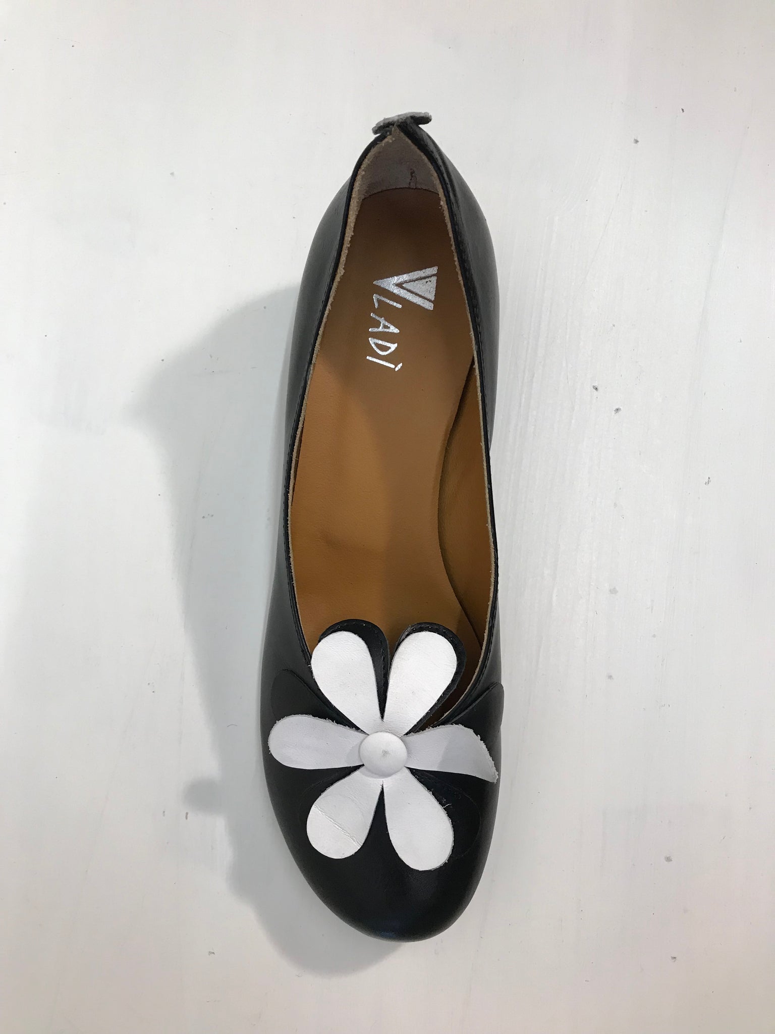 Vladi 360 black and white leather flower slip on shoe